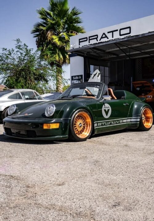 prato-motorwerks-auto-repair-expo-akira-nakai-911-1 akira nakai 911 porsche parked on prato motorwerks auto shop in covina